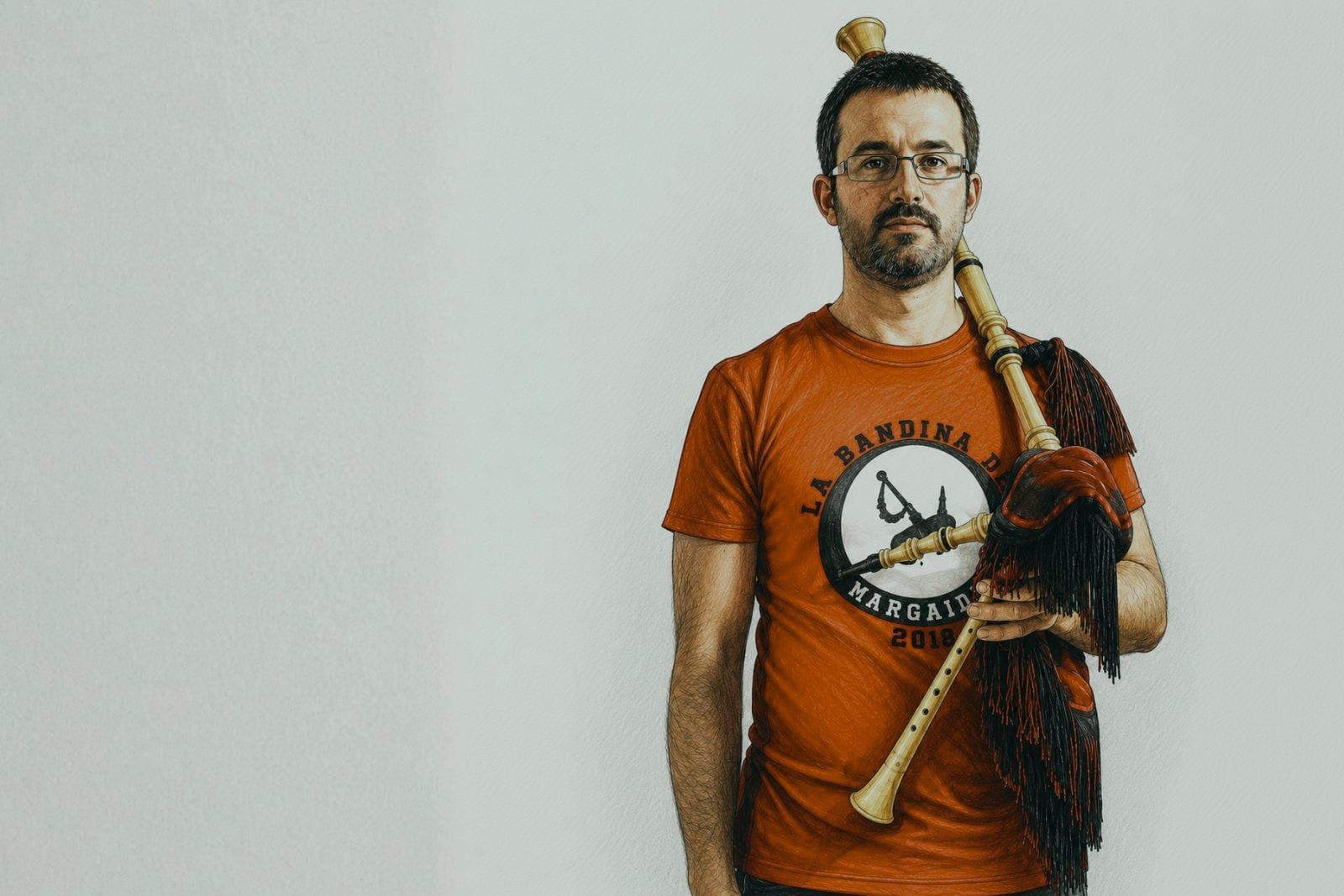 Portrait of Tever holding his Asturian gaita, against a pale background